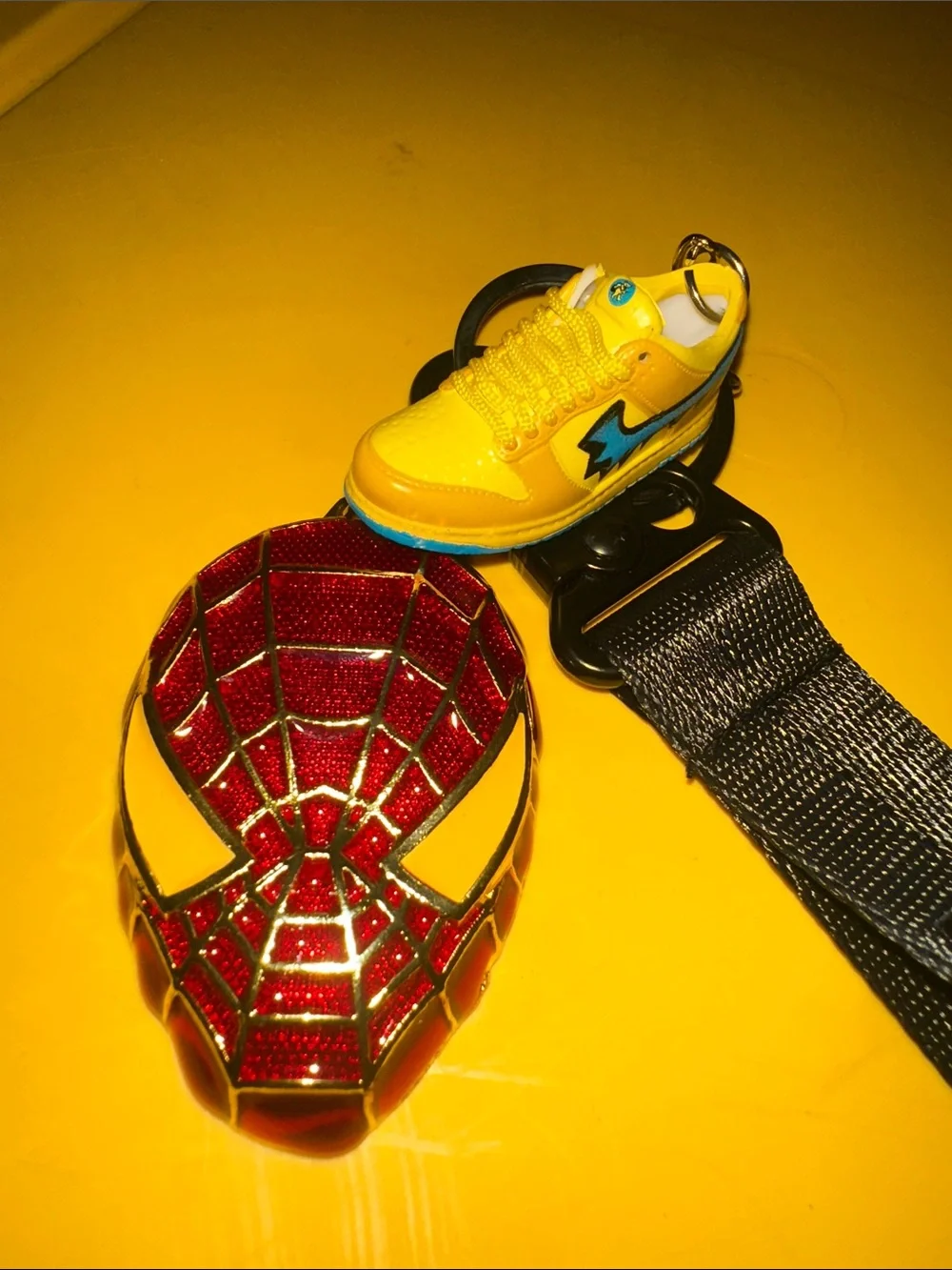 Jordan Kids Black Lanyard with Yellow jordSneaker Charm and Red Spider man Badge